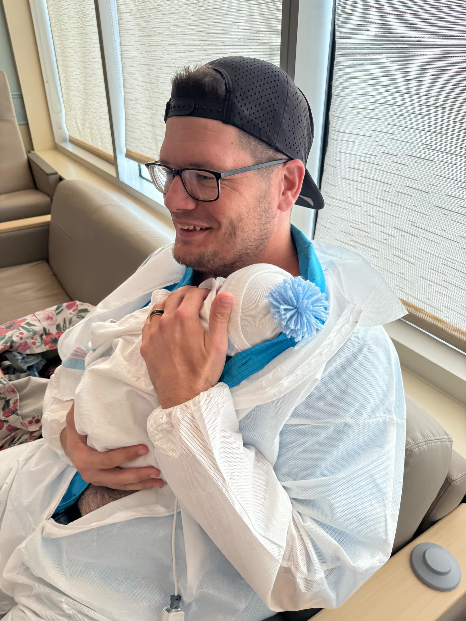 Photo of Kody Mott holding baby Jackson